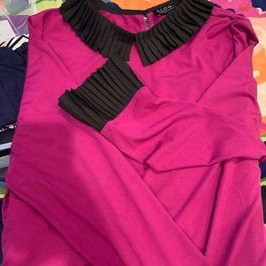 Blouse with ruffle at wrist and collar